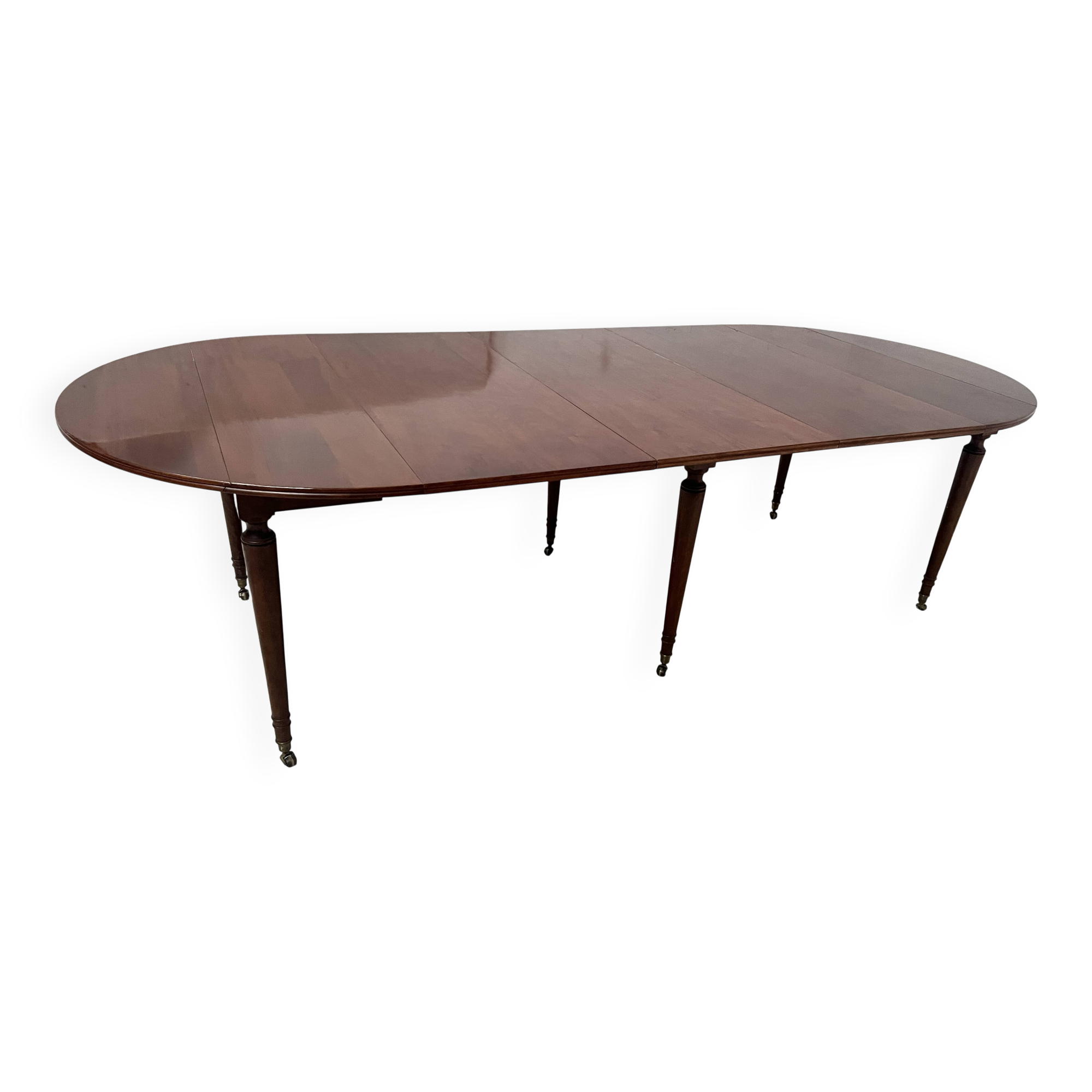 A six-foot Louis XVI style mahogany table from the 19th century.