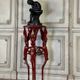 Athenian carved wood, red patina imitation of red marble