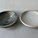 2 enameled stoneware cups, one of which is signed