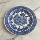 Set of four flat plates from English earthenware.