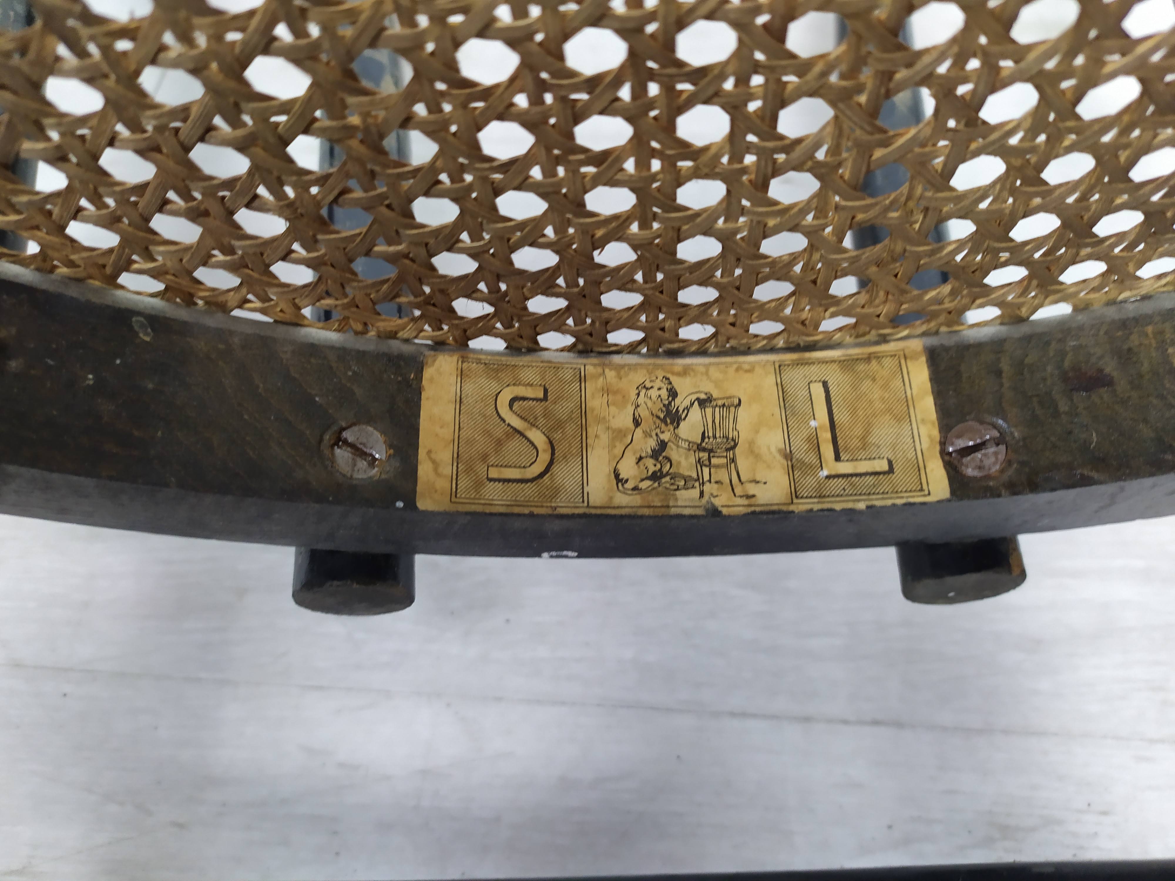 Black canned bistro chairs