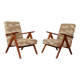Pair of vintage lounge chairs in brown jacquard fabric and wood.