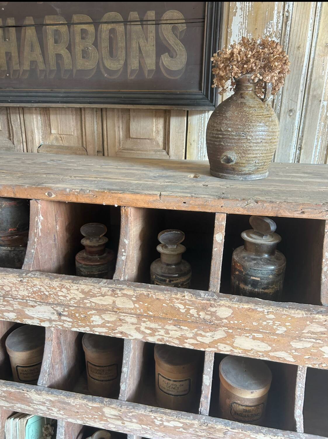 Antique seed cabinet with compartments