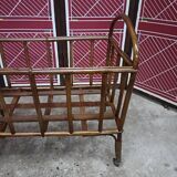Old small bed or cradle for baby in vintage rattan