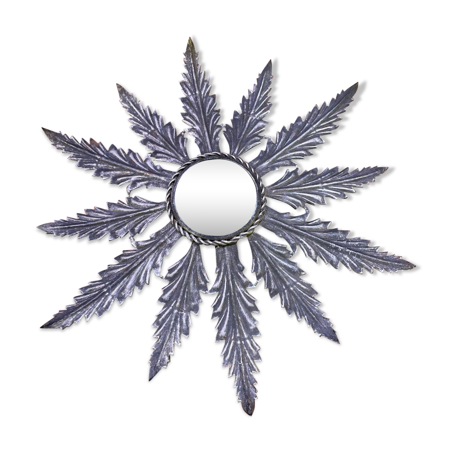 Metal mirror with foliage decoration