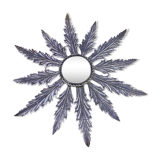 Metal mirror with foliage decoration