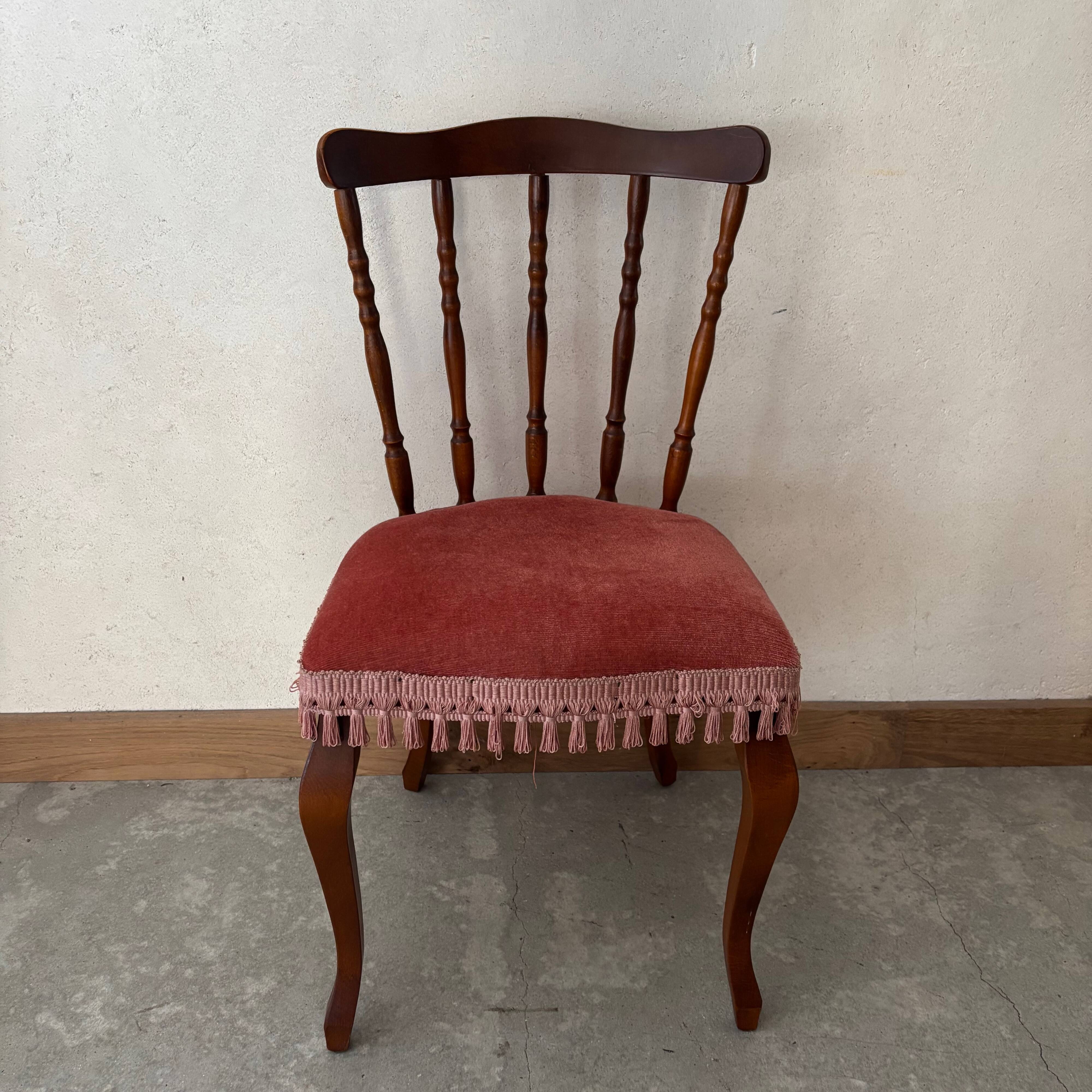 Wooden chair with red velvet