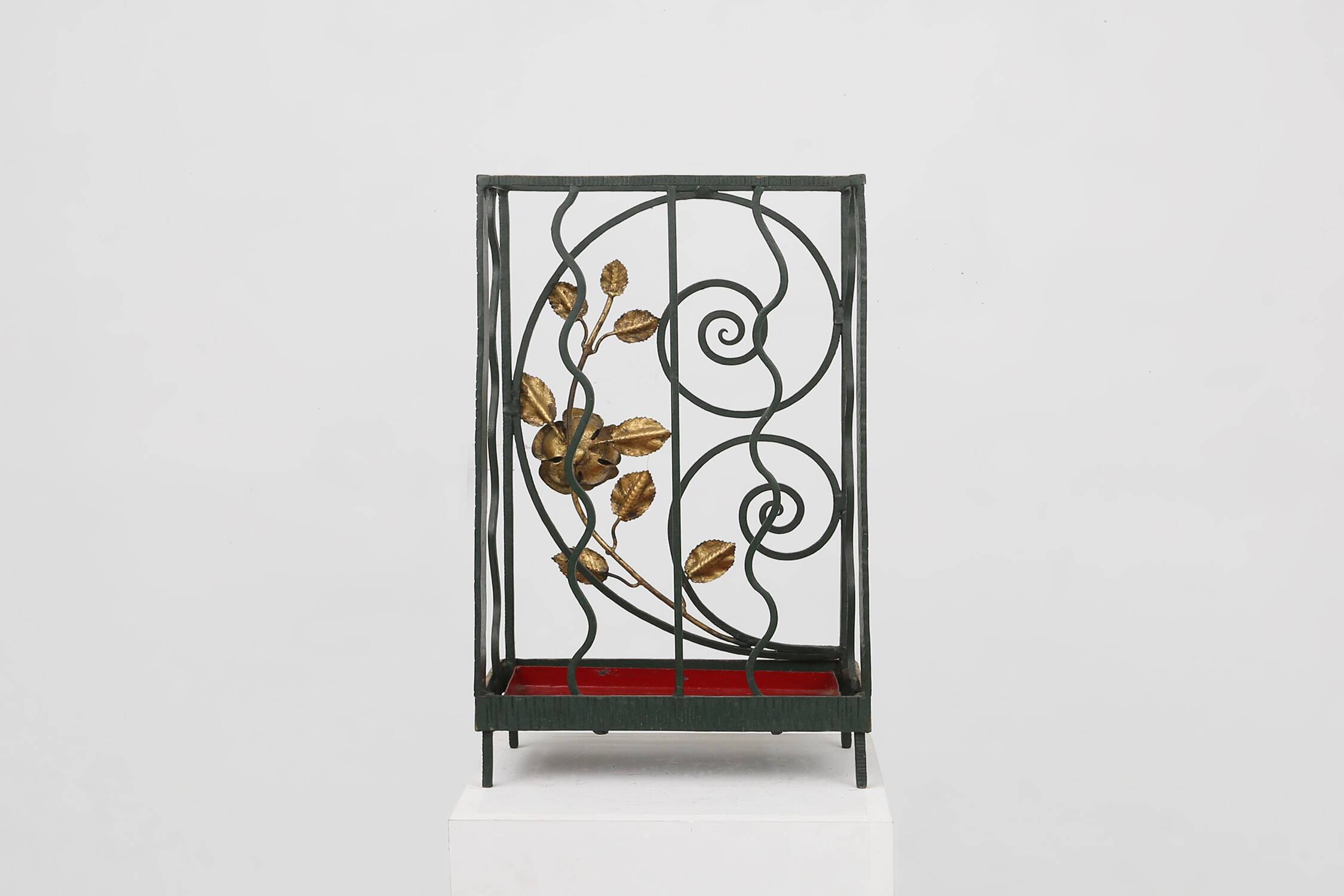 Art deco wrought iron umbrella stand with floral decoration, France ca. 1930