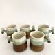 5 glazed and scarified ceramic cups