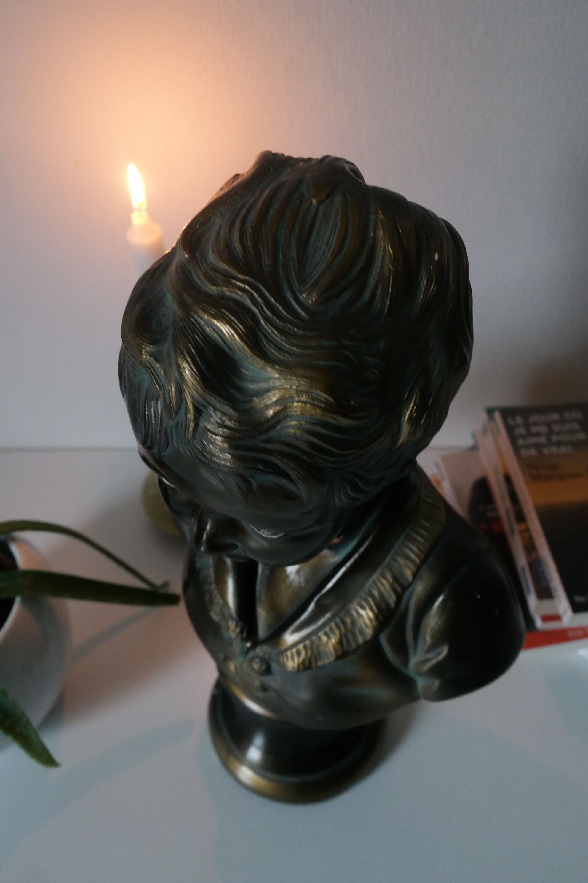 Buste en plâtre garçon patine bronze XXème