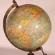 Small terrestrial globe by J. Forest, published by Girard & Barrière, early 20th century