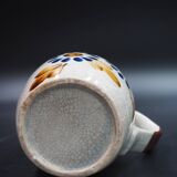 Small stoneware water pot with floral pattern