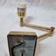 Gilded brass hinged sconces