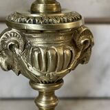 Pair of gilt bronze ram's head candlesticks, Louis XVI style, 19th century.