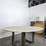 Italian dining table with a travertine top.