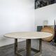 Italian dining table with a travertine top.