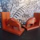 Pair of teak bookends in the shape of a bison