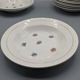 12 hollow porcelain plates, floral decoration and golden ledé - ∅: 23cm