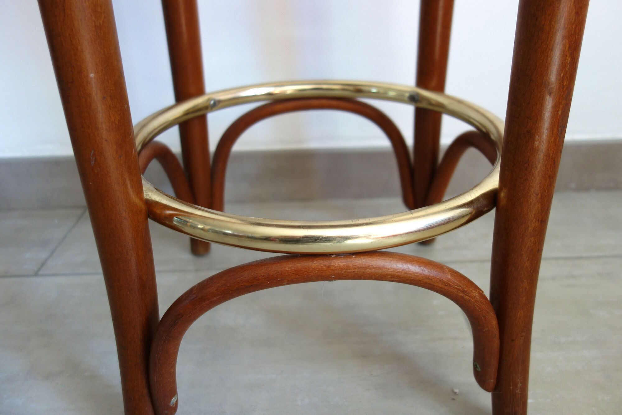 Former curved wooden bistro stool