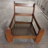 Armchairs in leather and vintage wood 70's