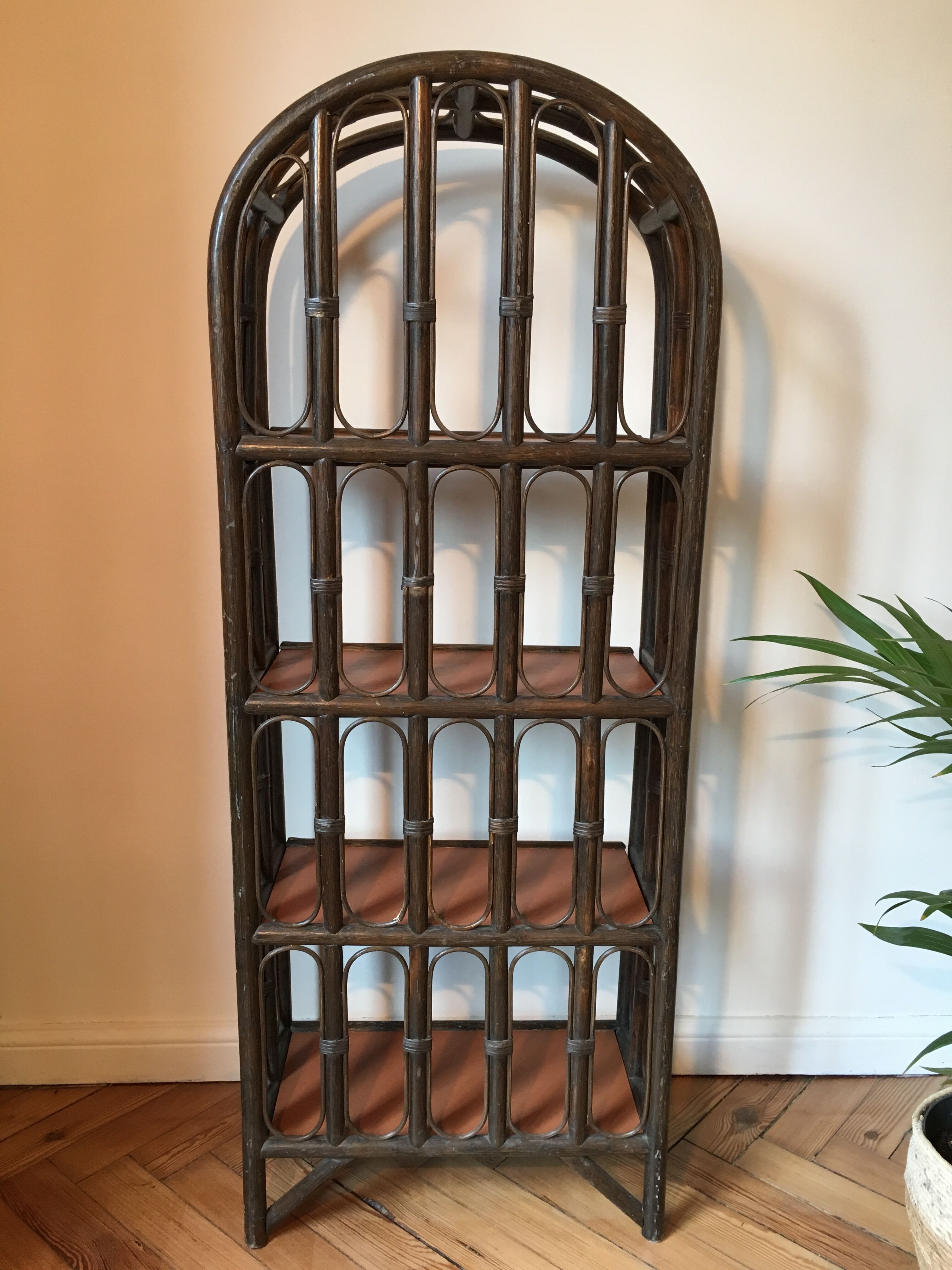 Vintage rattan library and terracotta-coloured tablets
