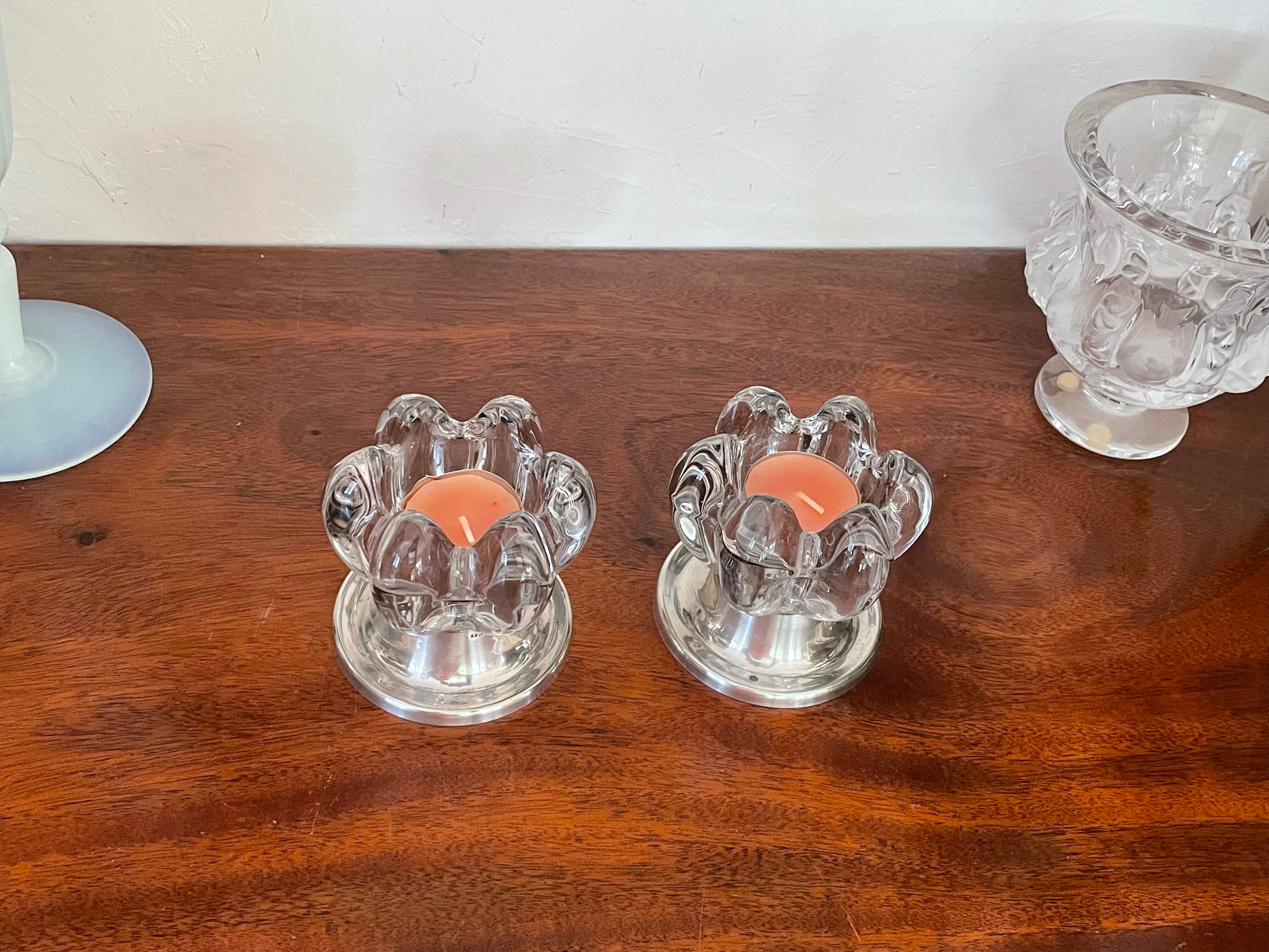 Pair of candle holders in crystal and vintage silver metal