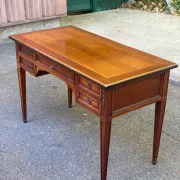 Bureau Roche Bobois en merisier massif style Louis XVI avec tirettes