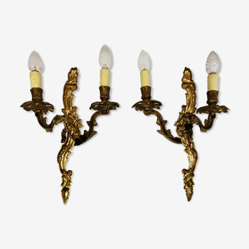 Pair of antique bronze wall lamps