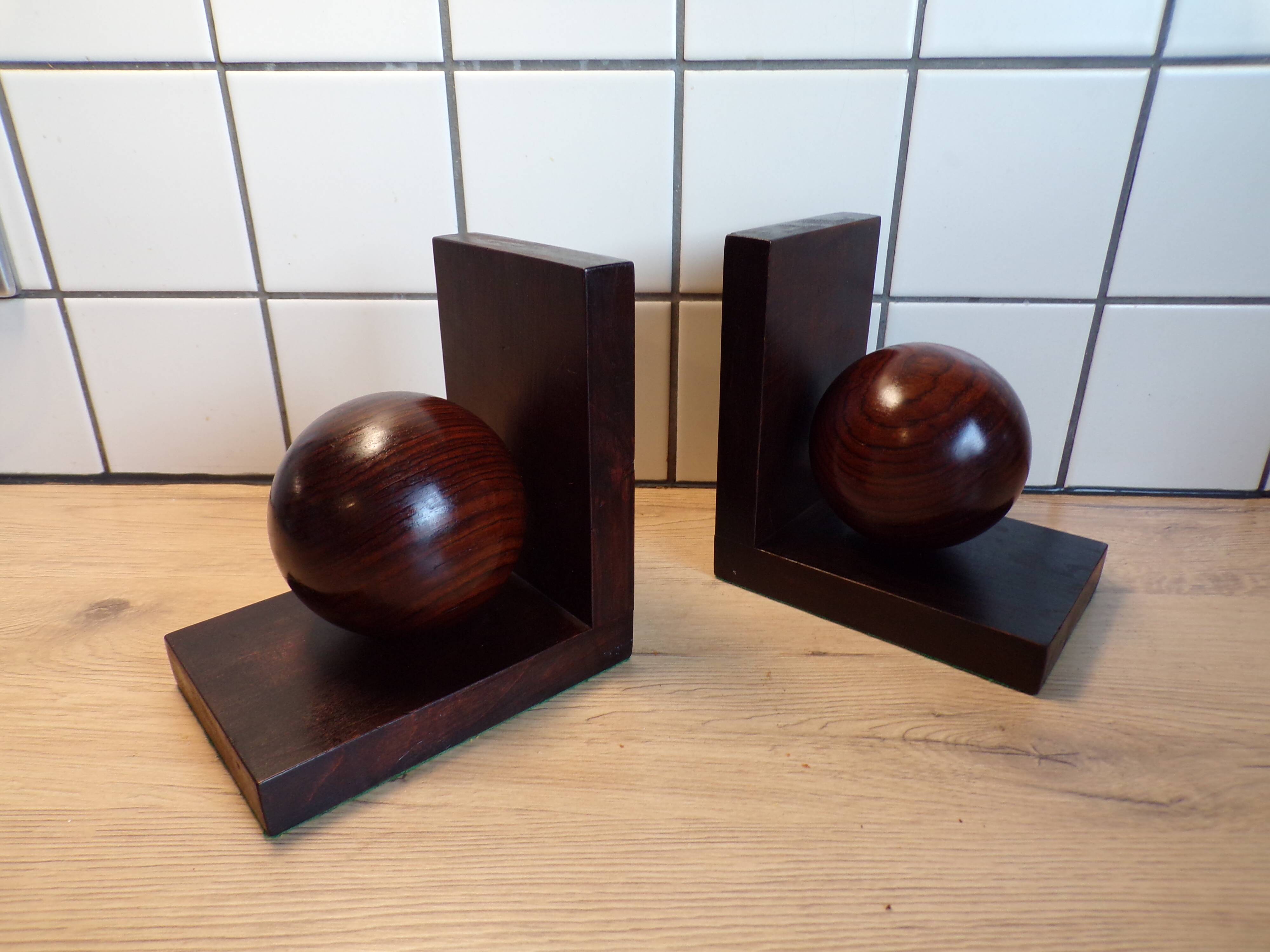 Paire de serre-livres art déco boule bois