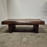 Rustic solid oak coffee table with a one piece top, France 1950s