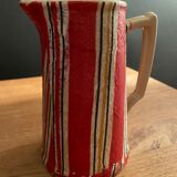 Earthenware pitcher covered with paper