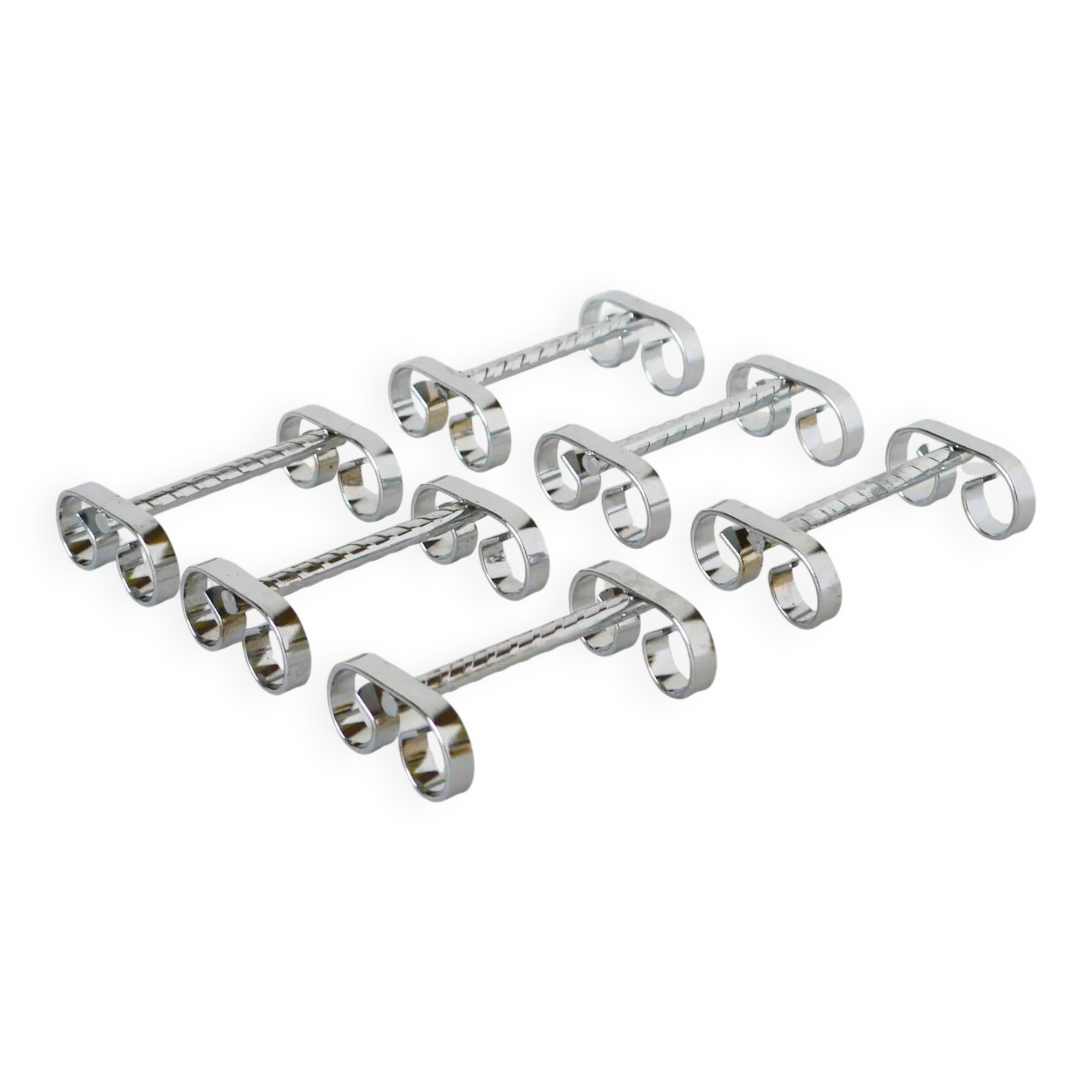 Ensemble de 6 porte-couteaux travaillés en inox, 1970