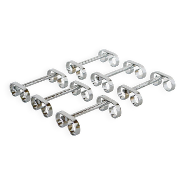 Set of 6 knife rests crafted in stainless steel, 1970.