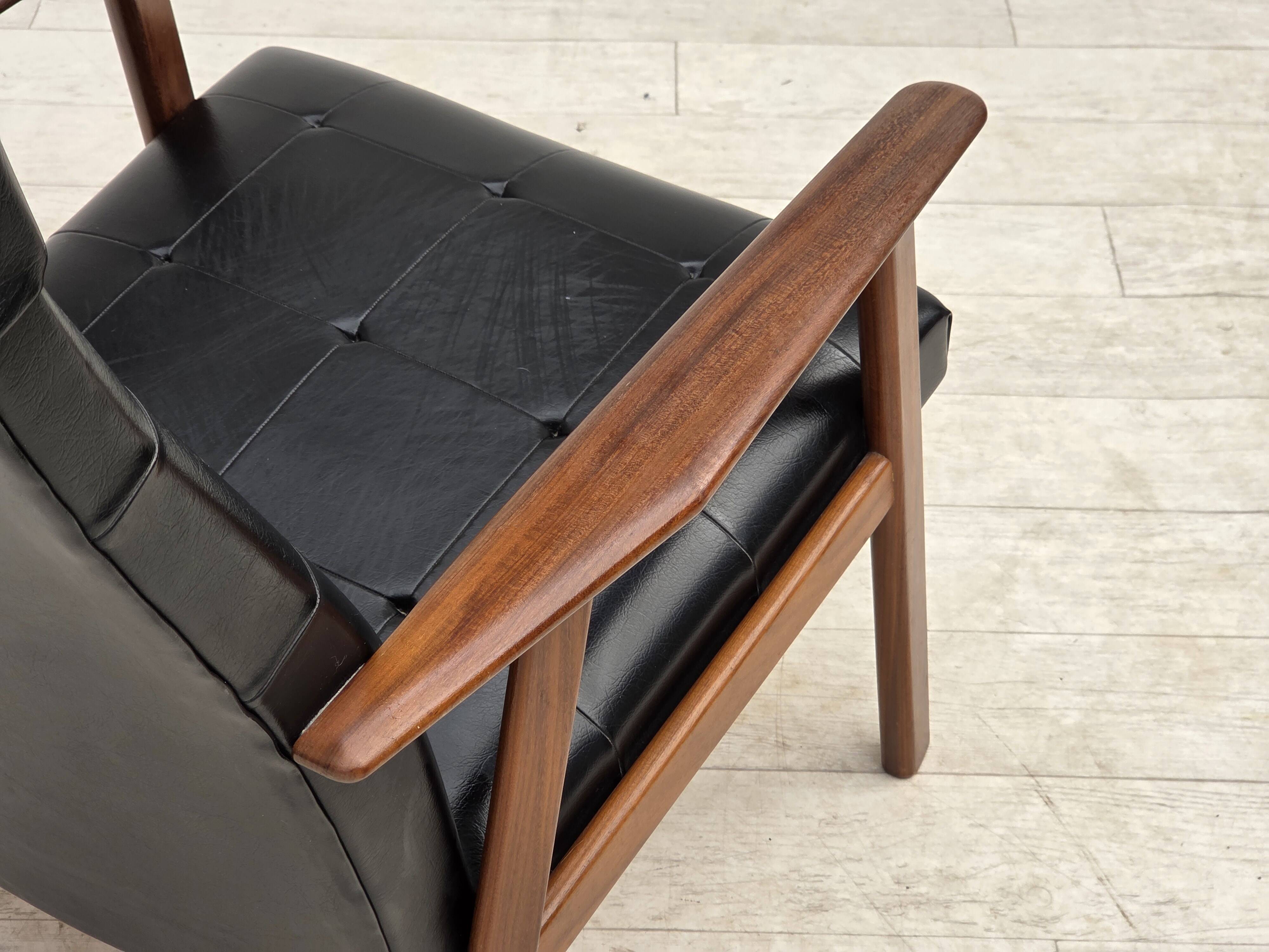 1970s, Danish armchair, black artificial leather, teak wood.