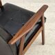 1970s, Danish armchair, black artificial leather, teak wood.