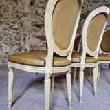 Chaises de salle à manger Louis XVI vintage – Ensemble de 8 chaises françaises sculptées en bois avec revêtement en simili cuir damassé caramel, années 1920/1930