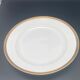 Round porcelain dish from Limoges golden tower
