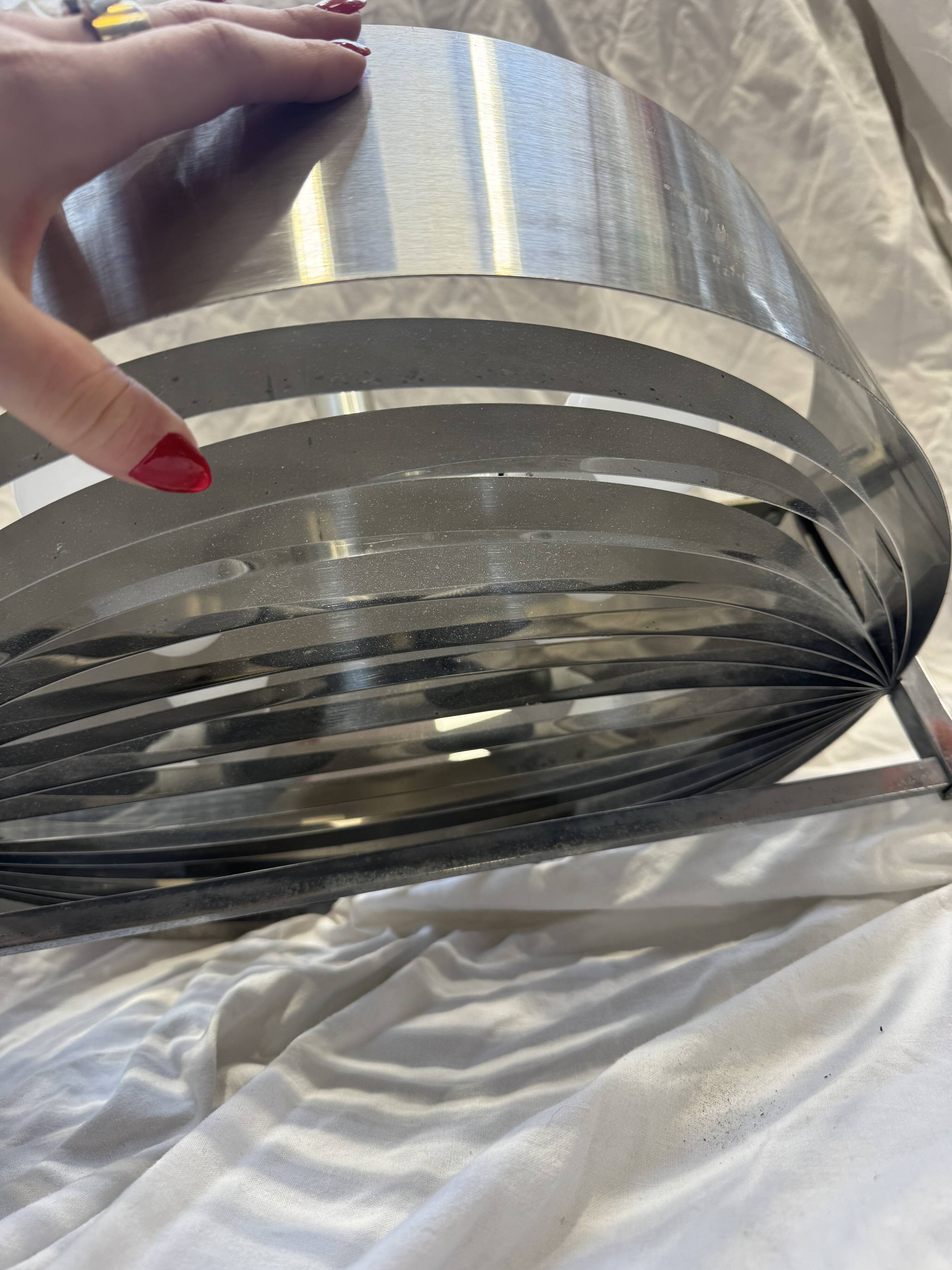 Brushed steel suspension