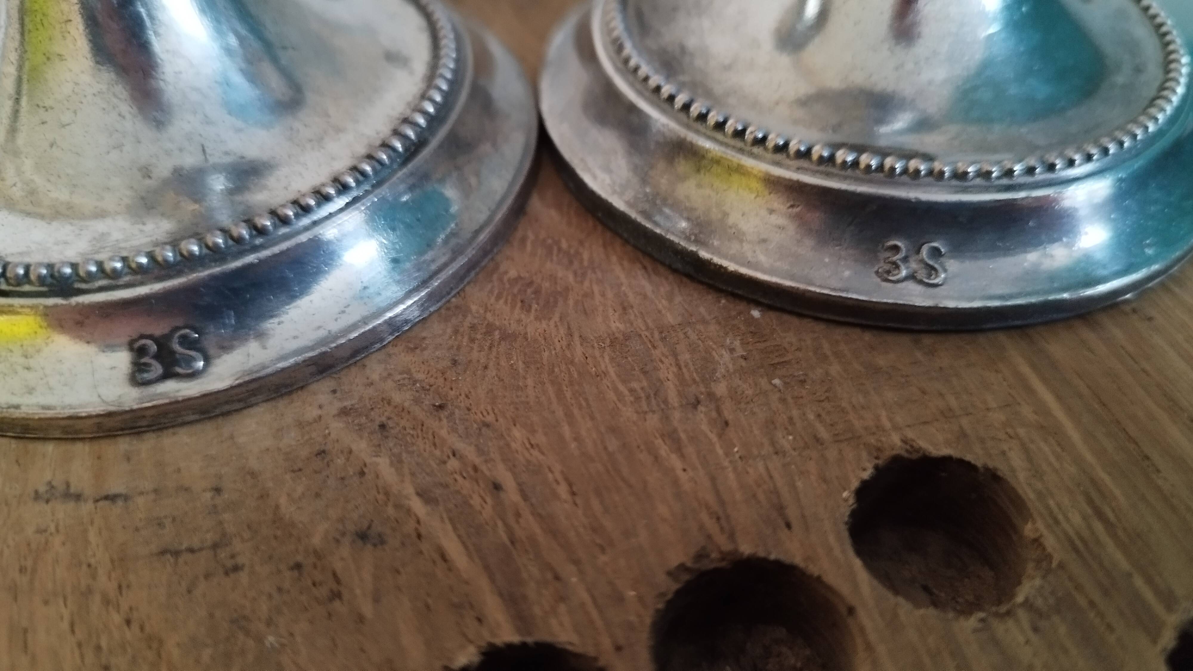 2 small silver metal candle holders