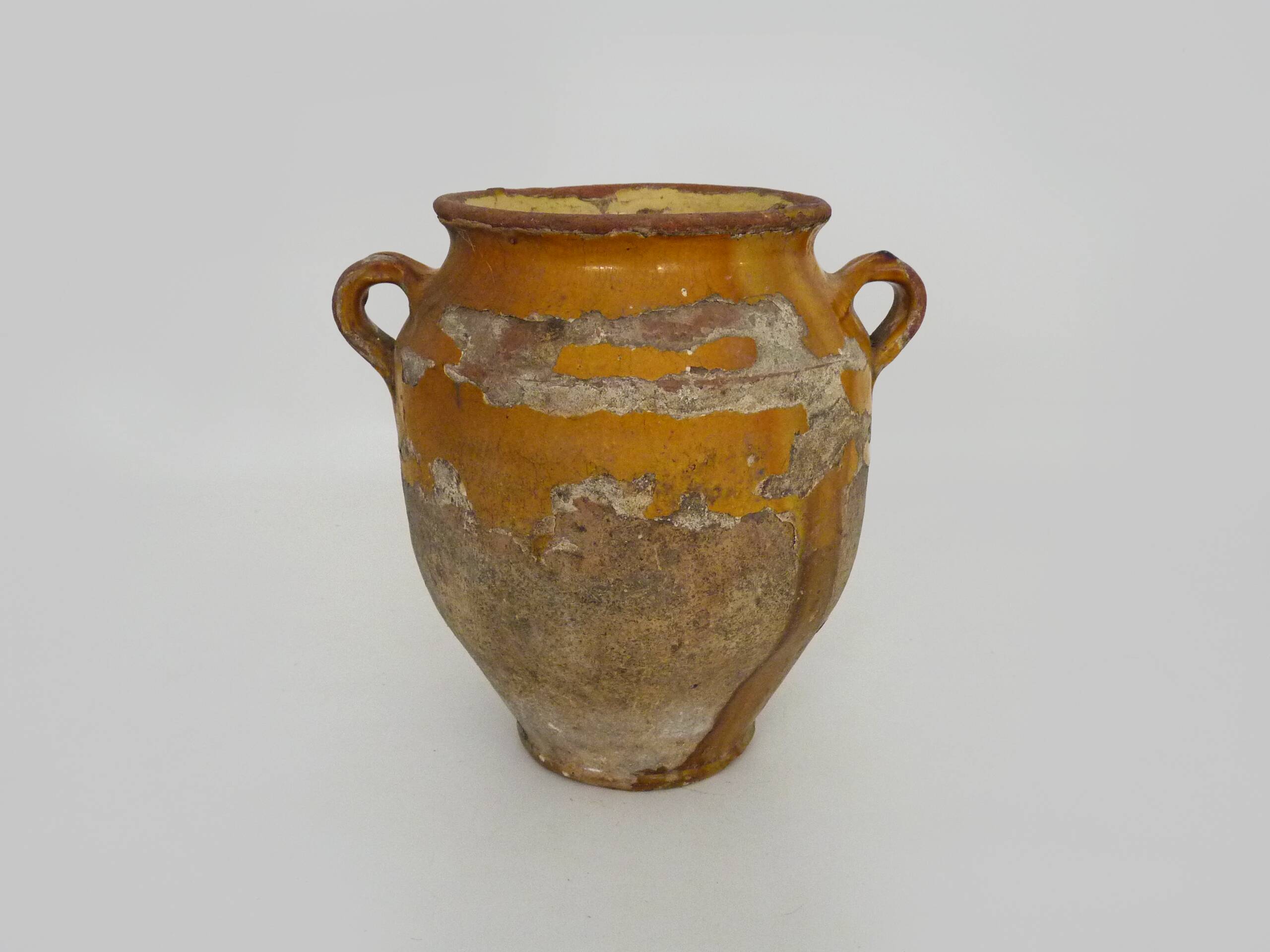 Magnificent glazed yellow confit pot, south-west of France. 19th century.