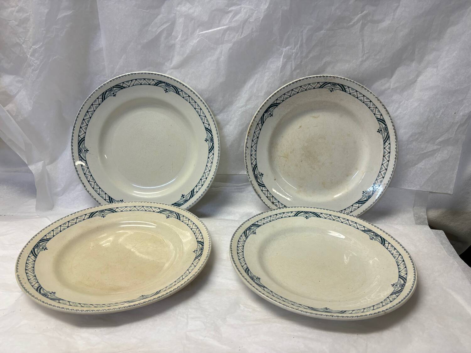 Set of 4 old iron earth plates