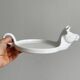 White porcelain cheese dish with handle and cow's head