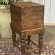 Teak bottle cabinet on legs in marine style