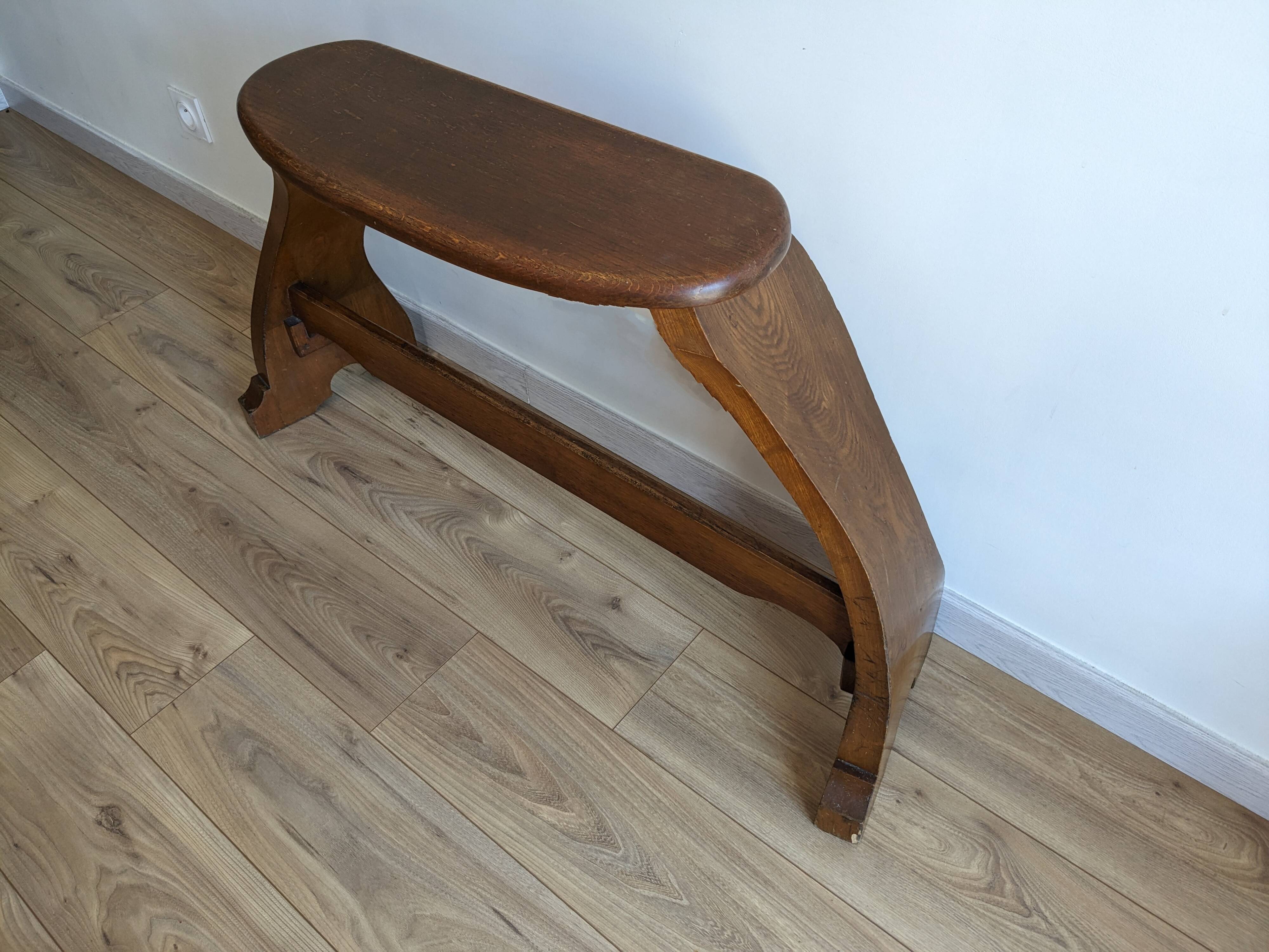 Old church organ bench in Art Nouveau style made of solid oak.