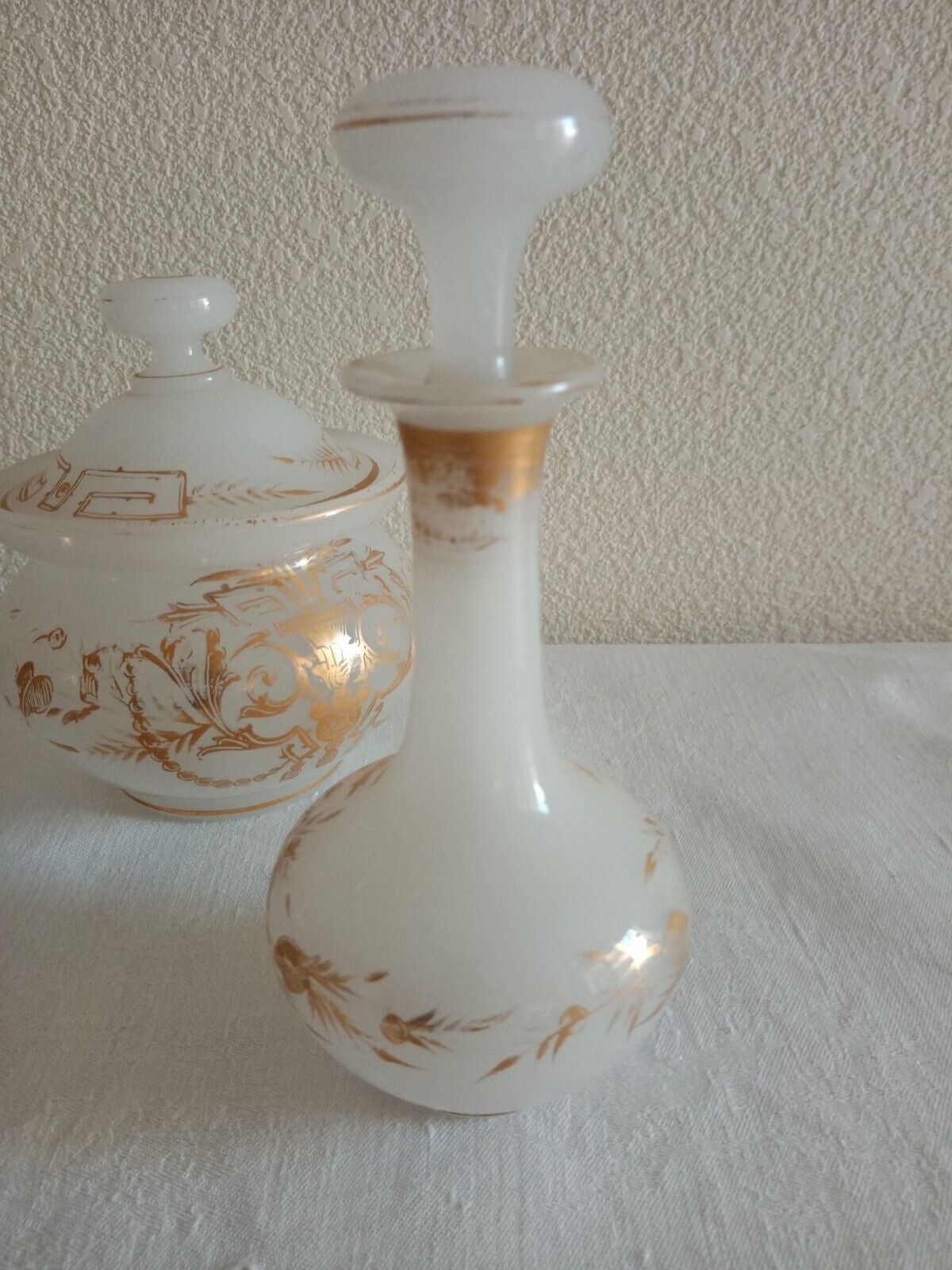 Suite Carafe, Carafon and Pot Opaline with gilded decorations XIX th