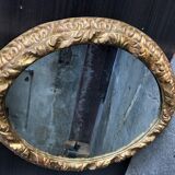 Gold oval mirror