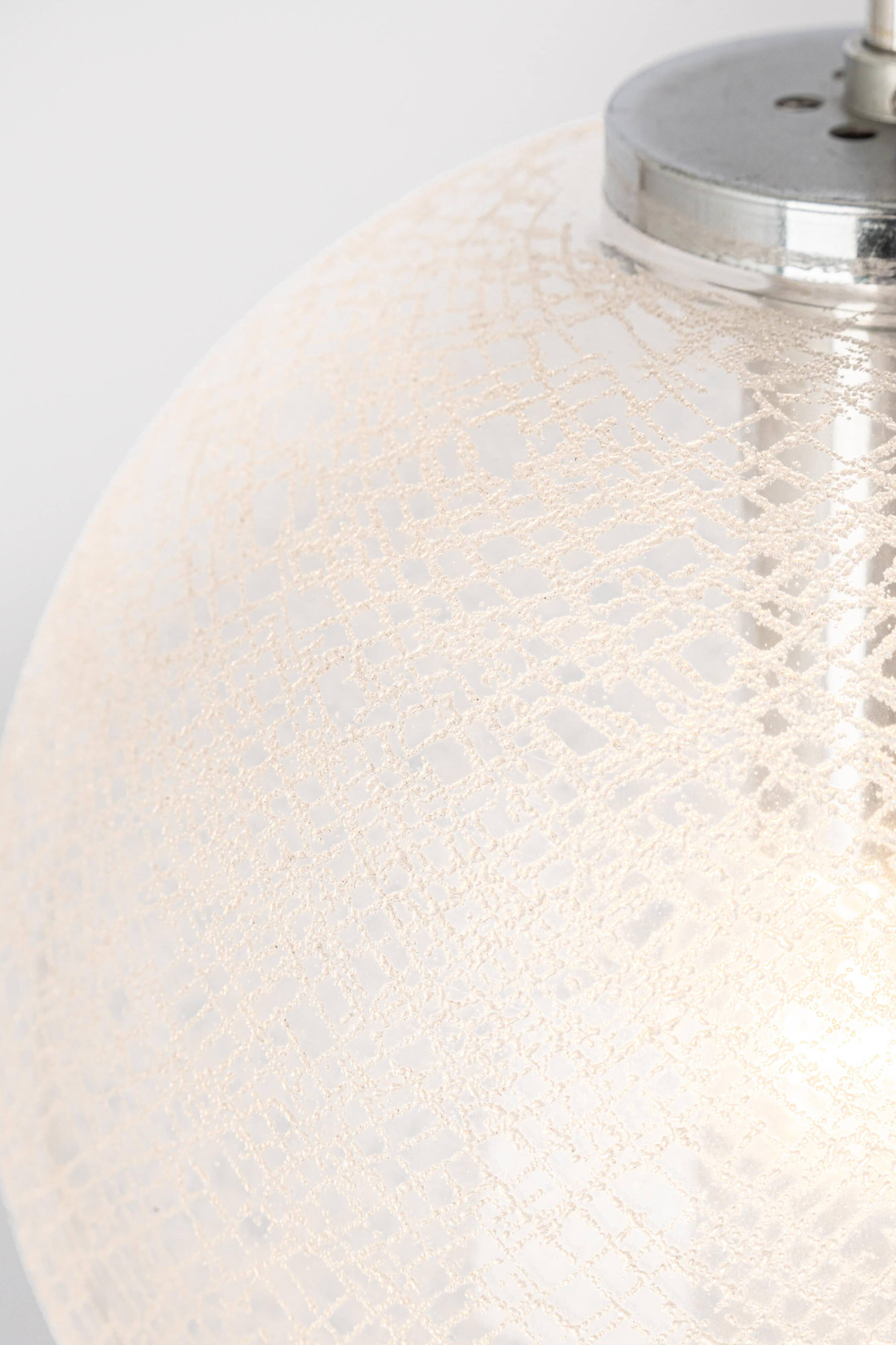 Small chrome Limburg pendant light with glass ball, Germany, 1970s.