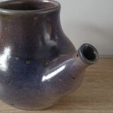 Lidded sandstone carafe