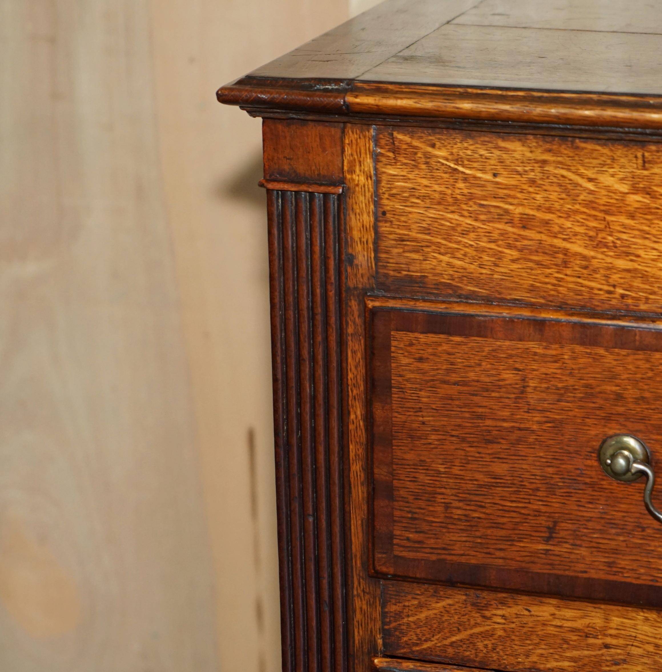 Georgian oak commode with a folding top, English, 18th century.