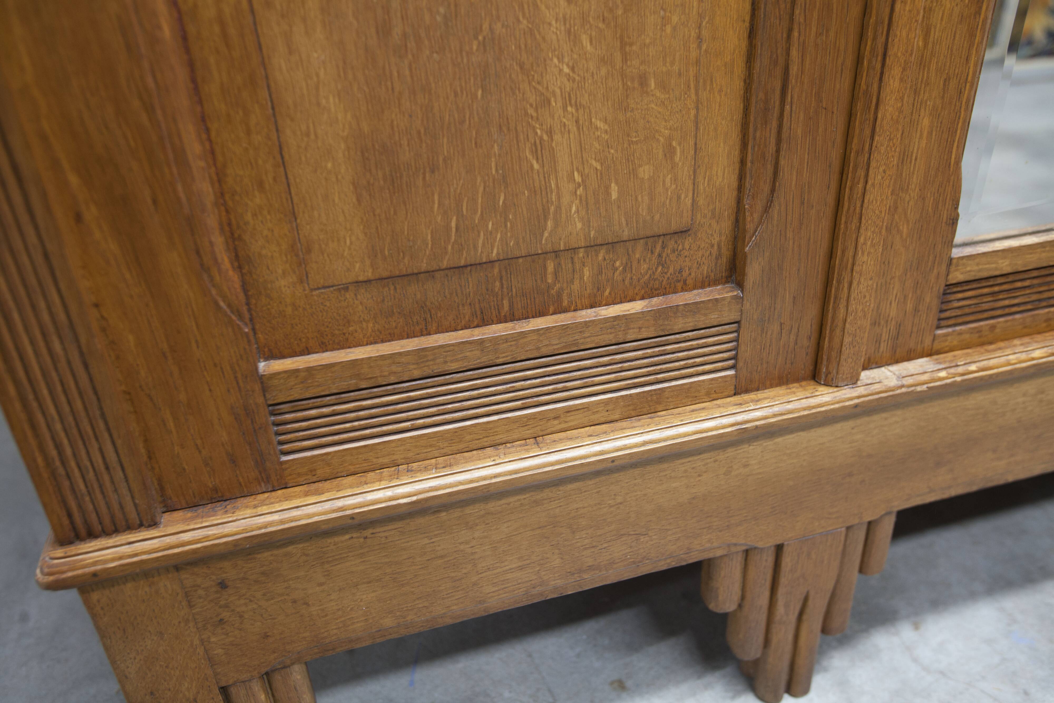 Art Deco carved oak wardrobe - Flemish workshop circa 1930